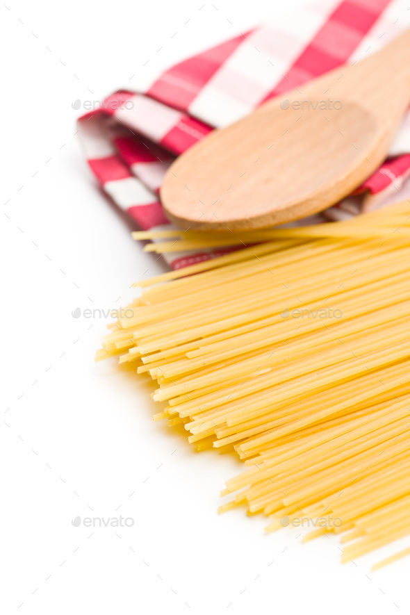 Uncooked spaghetti pasta. Stock Photo by jirkaejc PhotoDune